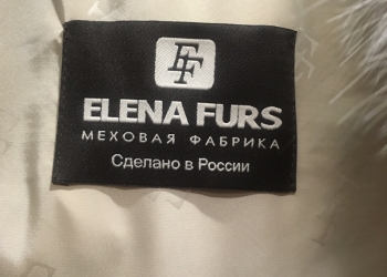 Меховая жилетка.
