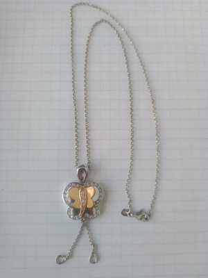 Комплект ювелирный с бриллиантами серьги и кулон