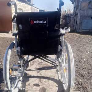 Инвалидная коляска