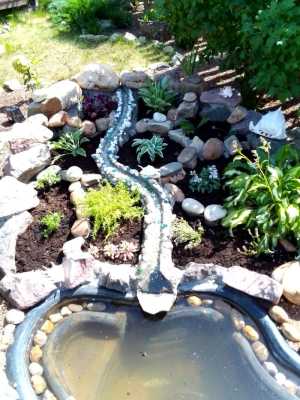 Альпийские горки, искусственные водоёмы, водопады