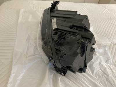 фара левая Geely Monjaro 7051047300