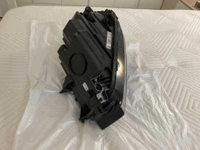 фара левая Geely Monjaro 7051047300