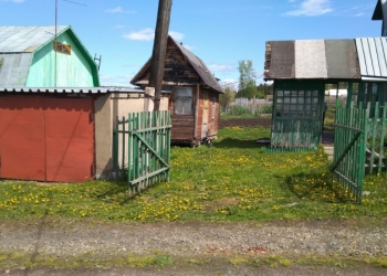 Дачный участок. Дом гараж
