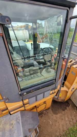 Продается Фронтальный погрузчик CASE 721D, 2006