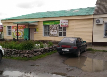Здание магазина с земельным участком