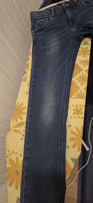 Джинсы утепленные на подростка