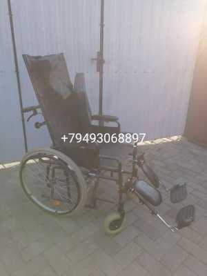 Инвалидная коляска.